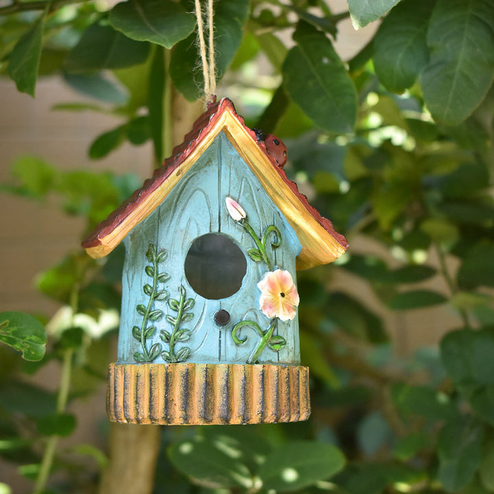 Decorative birdhouse made of resin for the wall