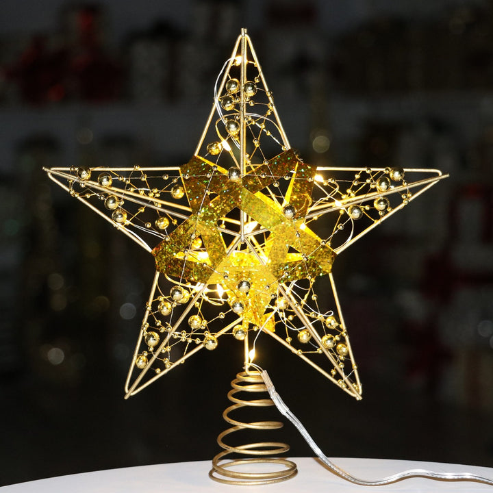 Christmas tree star top made of iron, illuminated