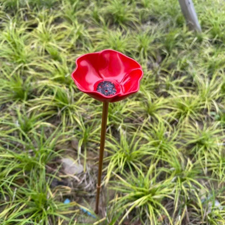 Decorative metal bird bath with ground stake