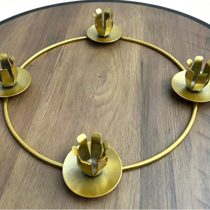 Metal candle holder in wreath design
