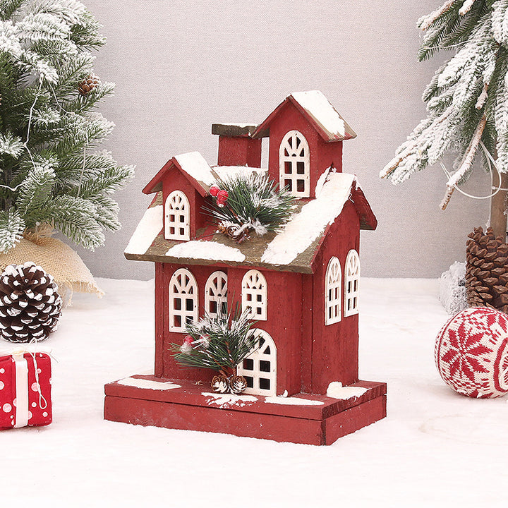 Illuminated red wooden house, Christmas decoration