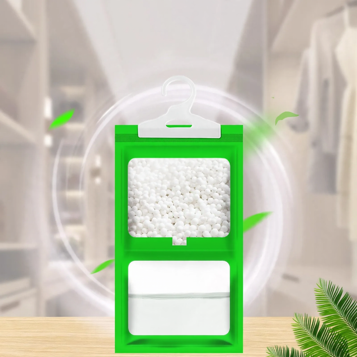Hanging dehumidifying bag for wardrobes