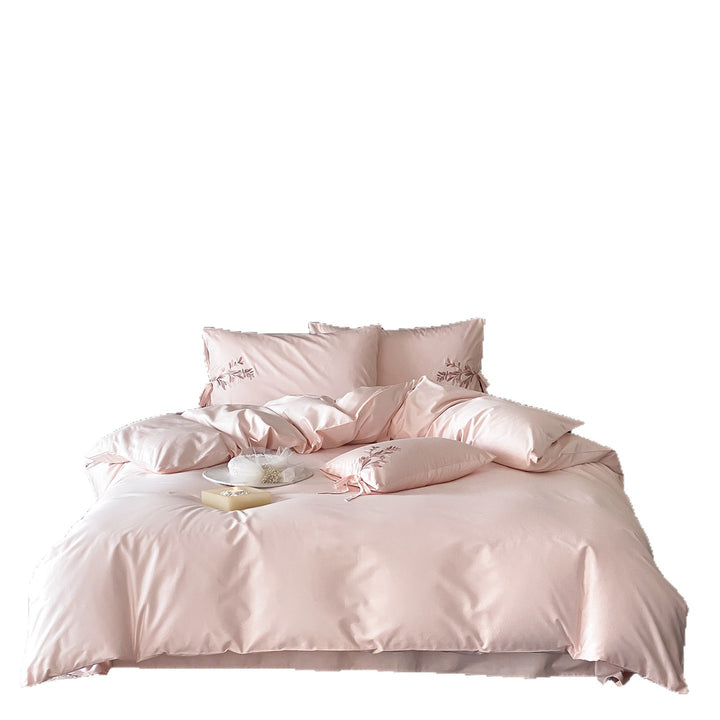 Embroidered cotton bedding with floral design