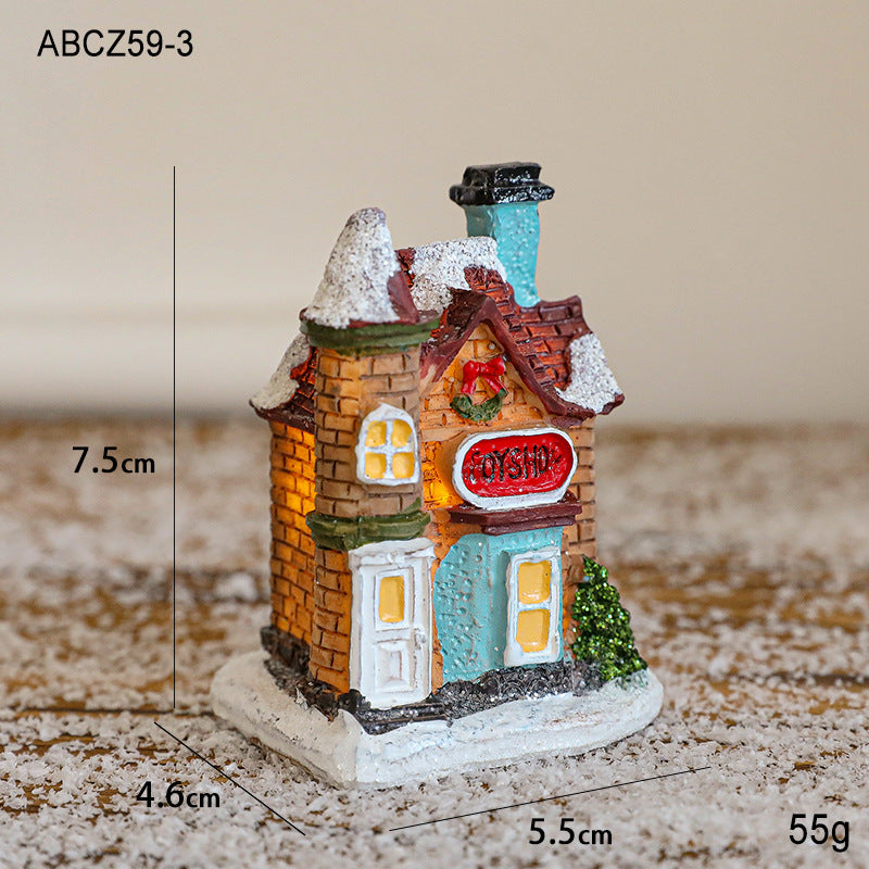 Illuminated Christmas house made of resin