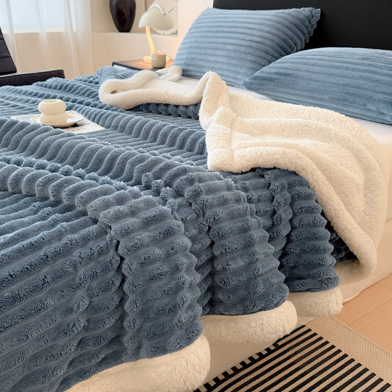 Double-layered, striped lamb fleece blanket