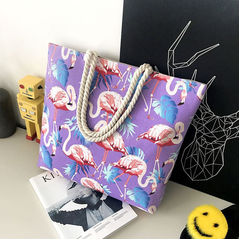 Large beach bag with vibrant flamingo motifs Bowlift