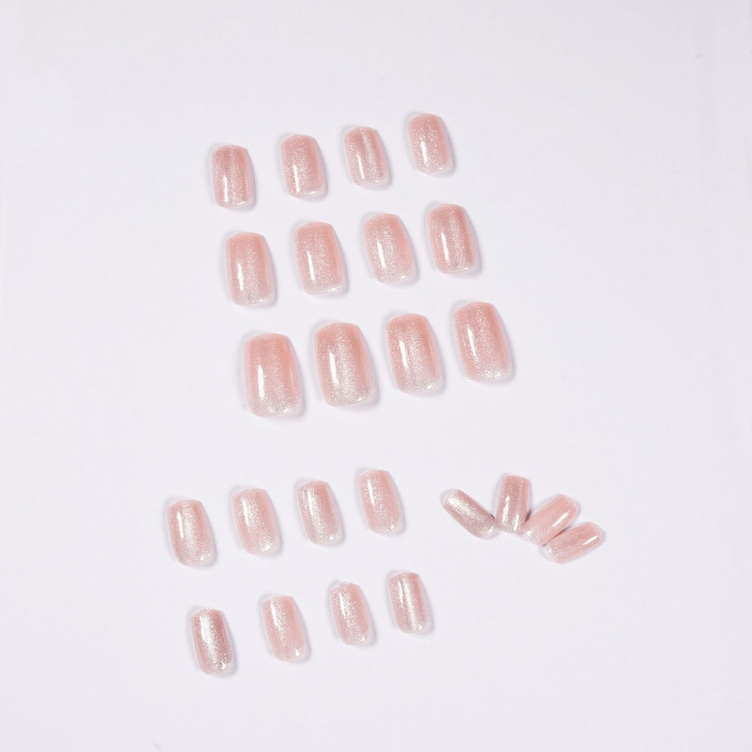 Artful nail art with a gentle glitter effect and elegant finish Bowlift