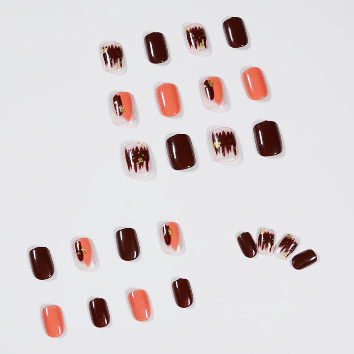 Artificial Nail Art with Gold Decorations Bowlift