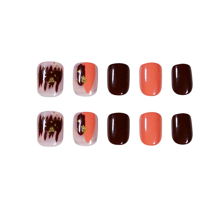 Artificial Nail Art with Gold Decorations Bowlift