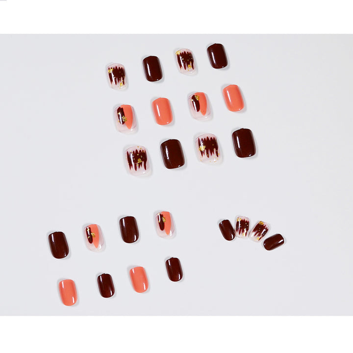 Artificial Nail Art with Gold Decorations Bowlift