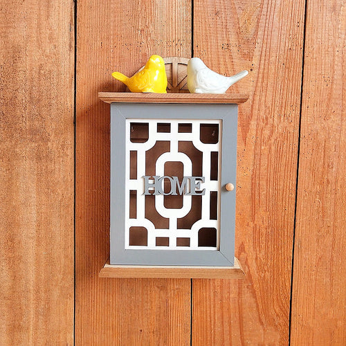 Wall-mounted home organizer with decorative design