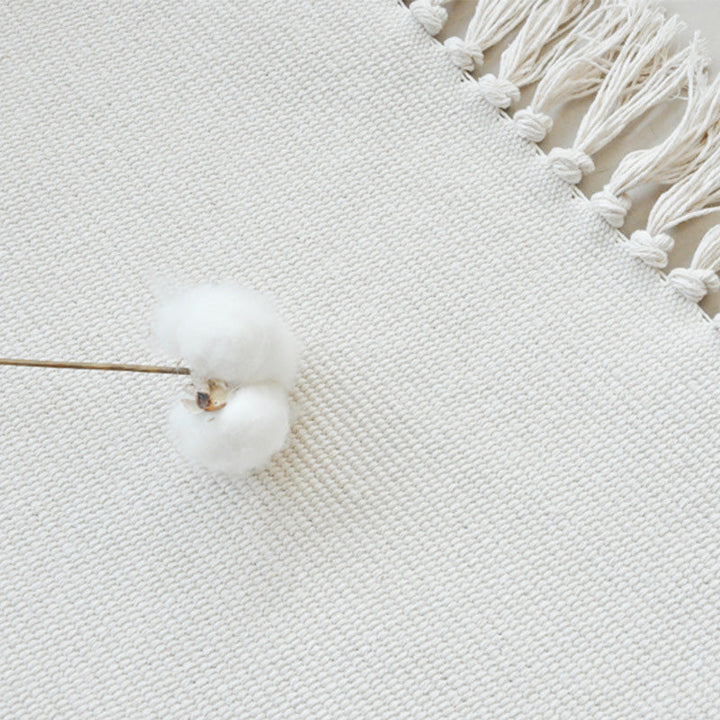 Simple solid color rug white cotton indoor rug handcrafted easy-care rug with fringes for the room | Bowlift