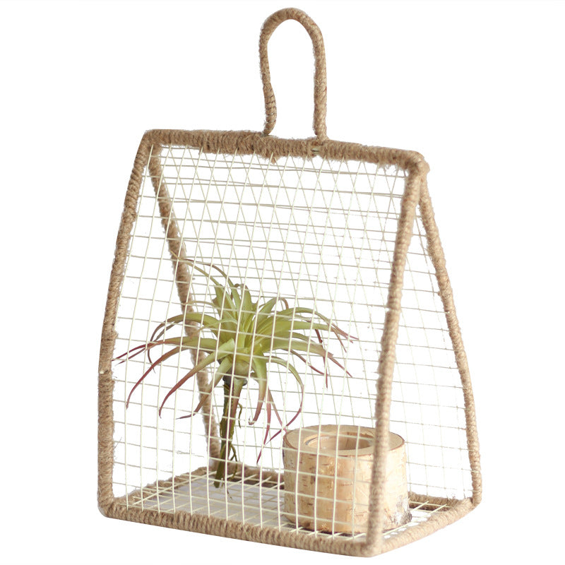 Decorative plant holder made of wire and natural fiber Bowlift