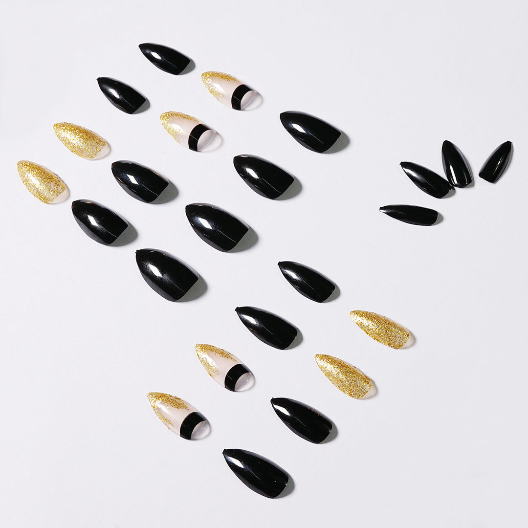 Artistic Nail Extensions with Black Gloss and Elegant Accents Bowlift
