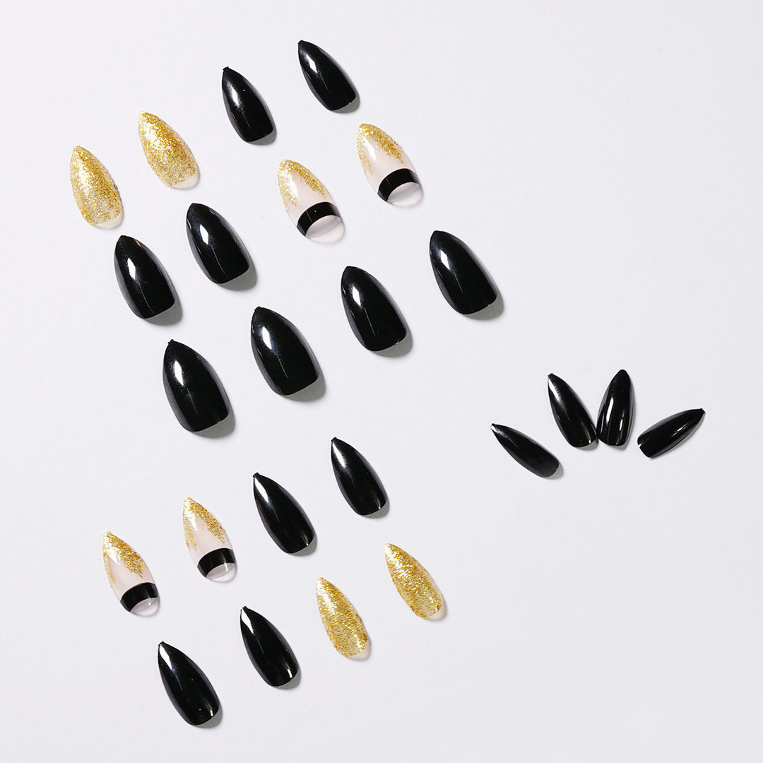 Artistic Nail Extensions with Black Gloss and Elegant Accents Bowlift