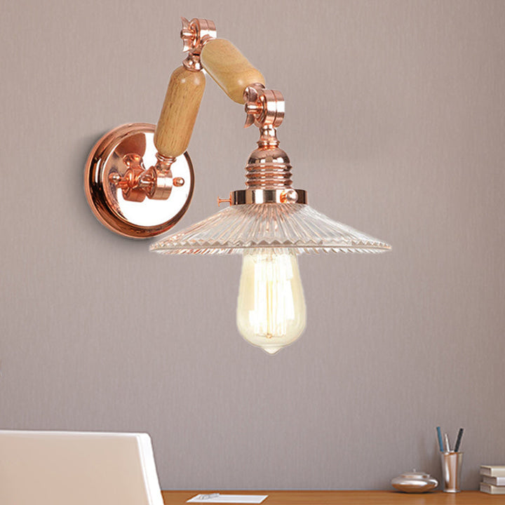 BowLift | A wall light with a light bulb and conical shade made of clear prismatic glass, industrial wall lamp for the living room with curved arm
