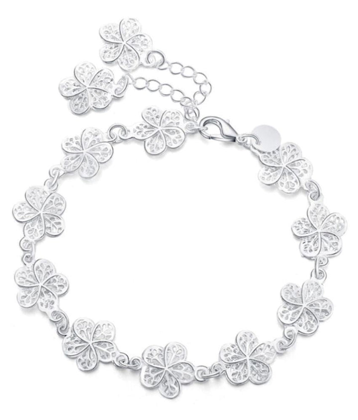 Elegant Silver Filigree Bracelet with Unique Links Bowlift