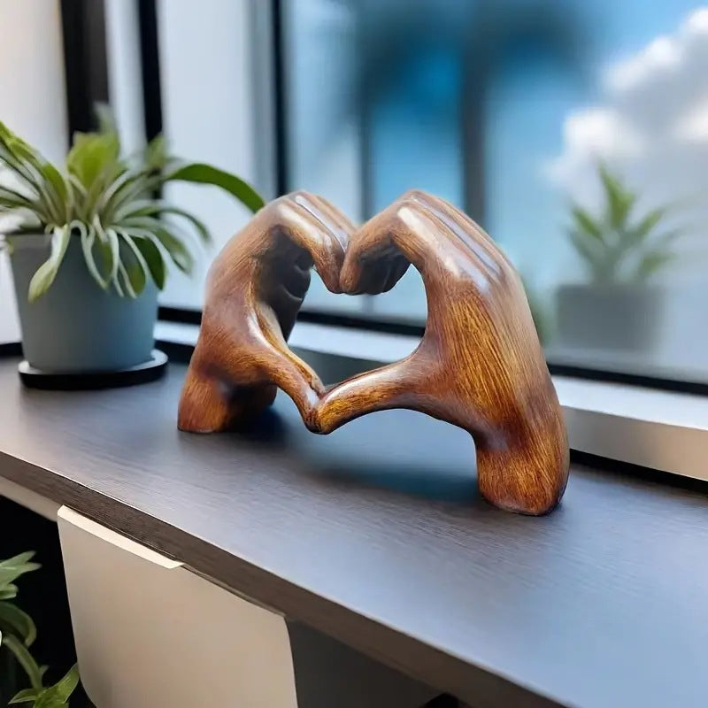 Statue of the Hands of the Heart | Bowlift
