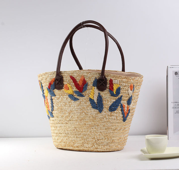 Braided beach bag with colorful embroidery pattern Bowlift