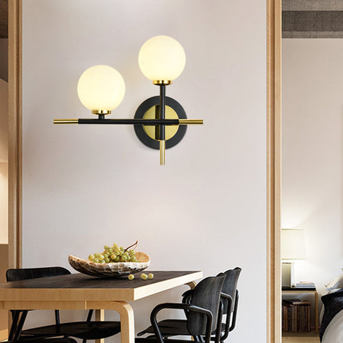 BowLift | Milk glass orb wall light with cross design 2 lights modern black and brass wall light
