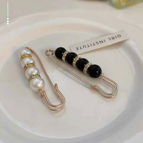 BowLift | Brooch made of pearls and alloy