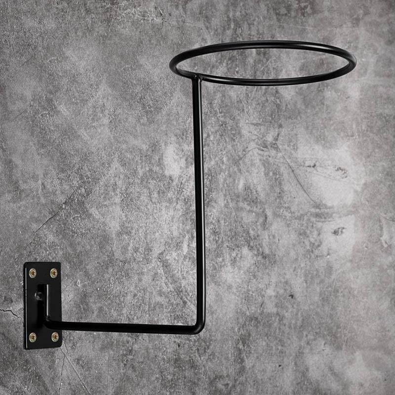 BowLift | Wall-mounted helmet holder