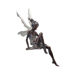 BowLift | Statue of sitting fairy in the garden