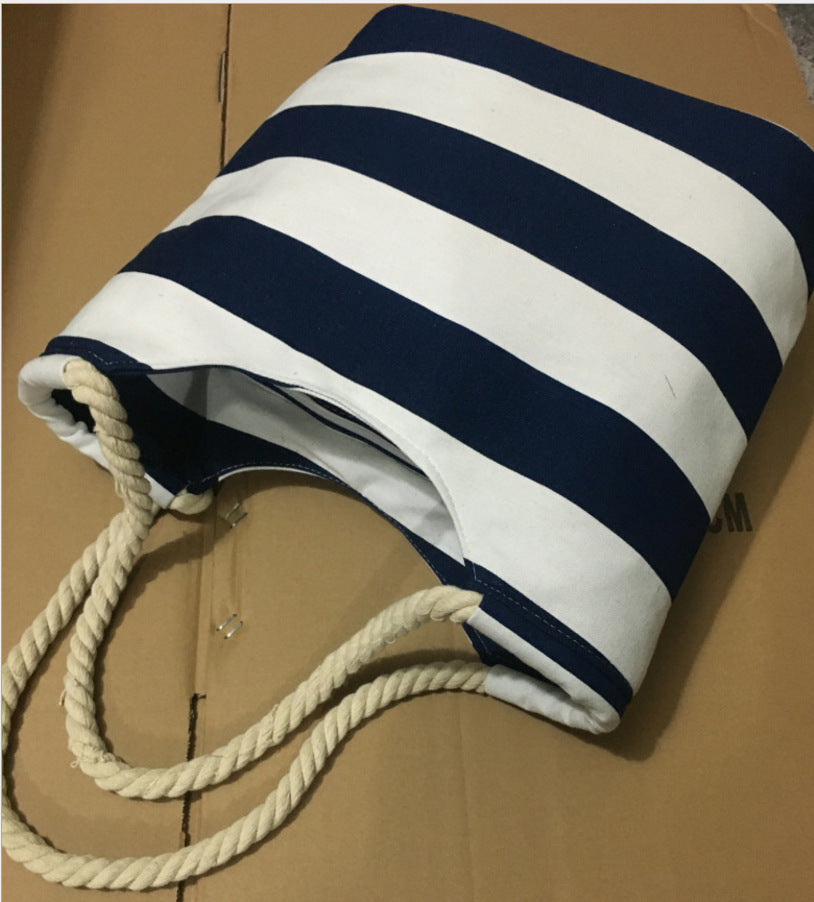 Beach bag made of durable canvas with colorful striped pattern Bowlift