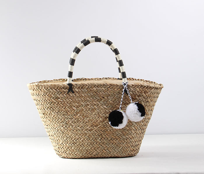 Braided beach bag with decorative pompons Bowlift