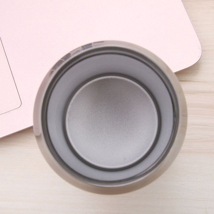 Women's insulated coffee mug with practical drinking attachment Bowlift