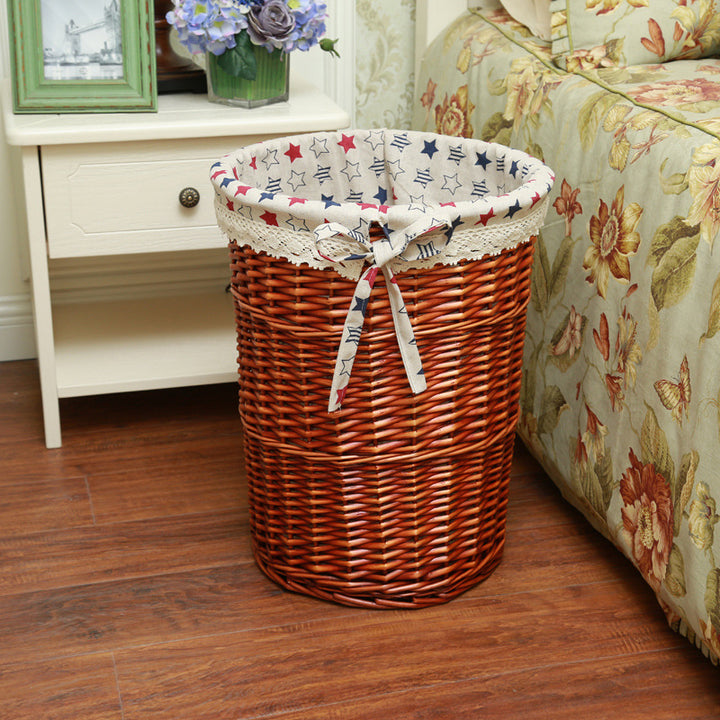 Women's laundry basket made of woven natural material with decorative fabric lining Bowlift