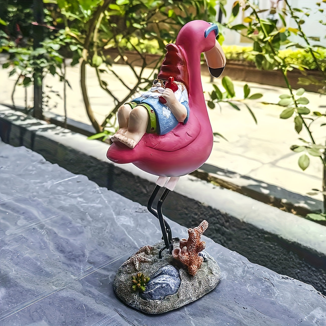 BowLift | Flamingo relaxing garden gnome statue