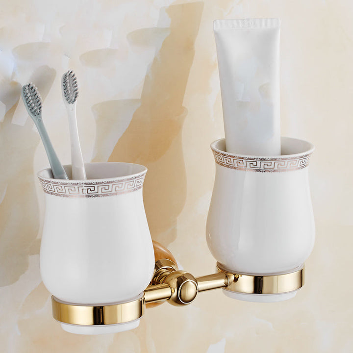 BowLift | Contemporary brushed brass bathroom accessories as a single piece or as a set