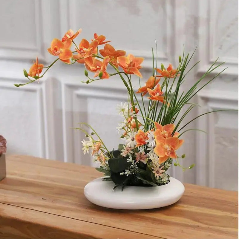 Lifelike flower arrangement in a modern vase Bowlift