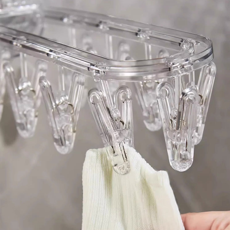 BowLift | Suction cup collapsible clothes hanger with clip