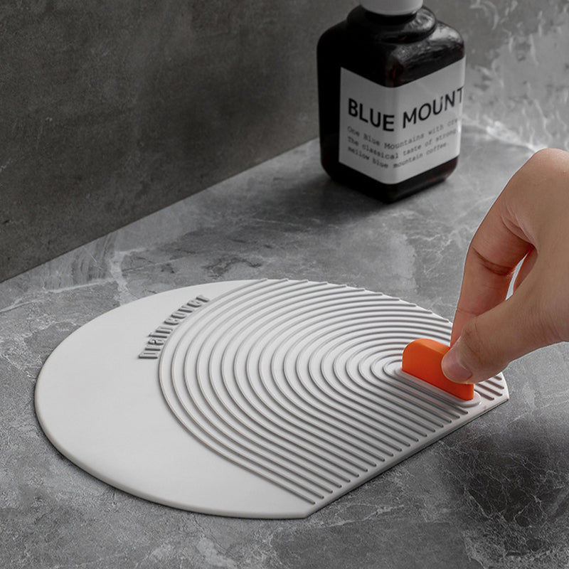 BowLift | Multi-purpose floor drain cover made of silicone
