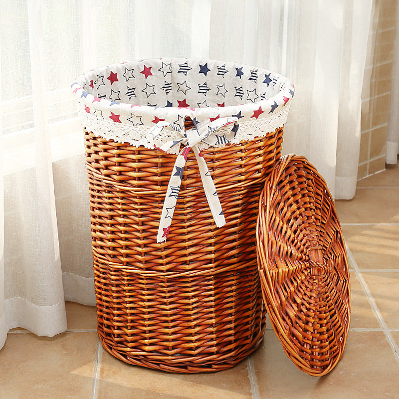 Women's laundry basket made of woven natural material with decorative fabric lining Bowlift