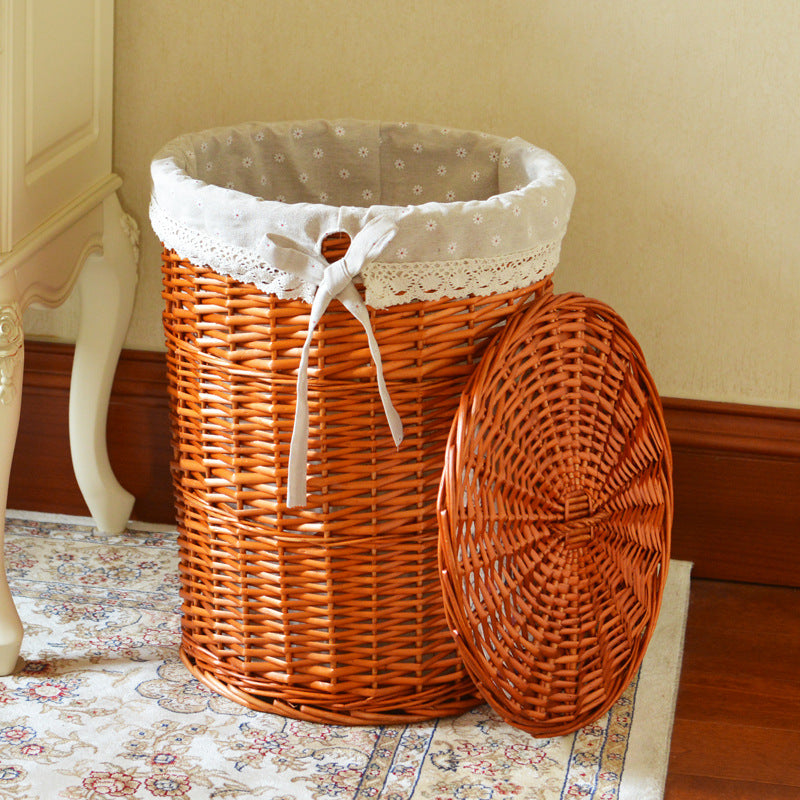 Women's laundry basket with decorative fabric lining and practical carrying handle Bowlift
