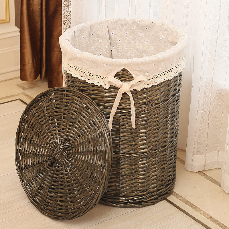 Women's laundry basket made of woven natural material with decorative fabric lining Bowlift