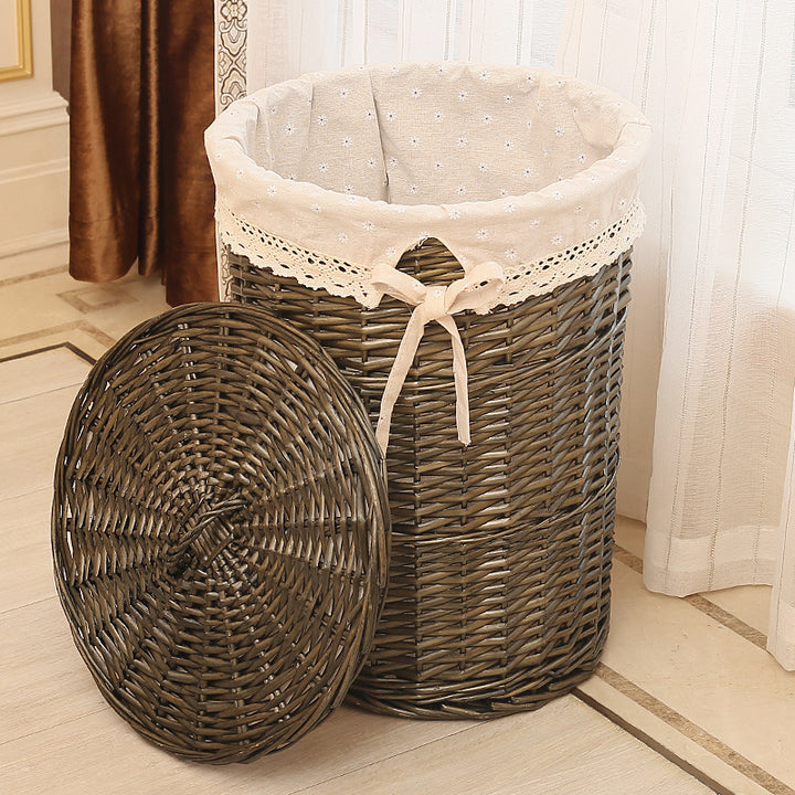 Women's laundry basket made of woven natural material with decorative fabric lining Bowlift