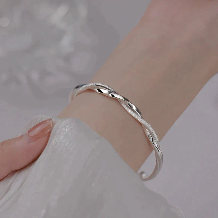 Elegant Twisted Silver Bracelet Bowlift