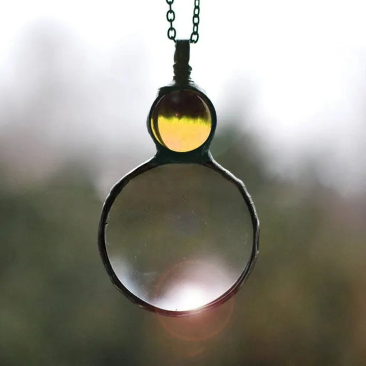 BowLift | Necklace with magnifying pendant