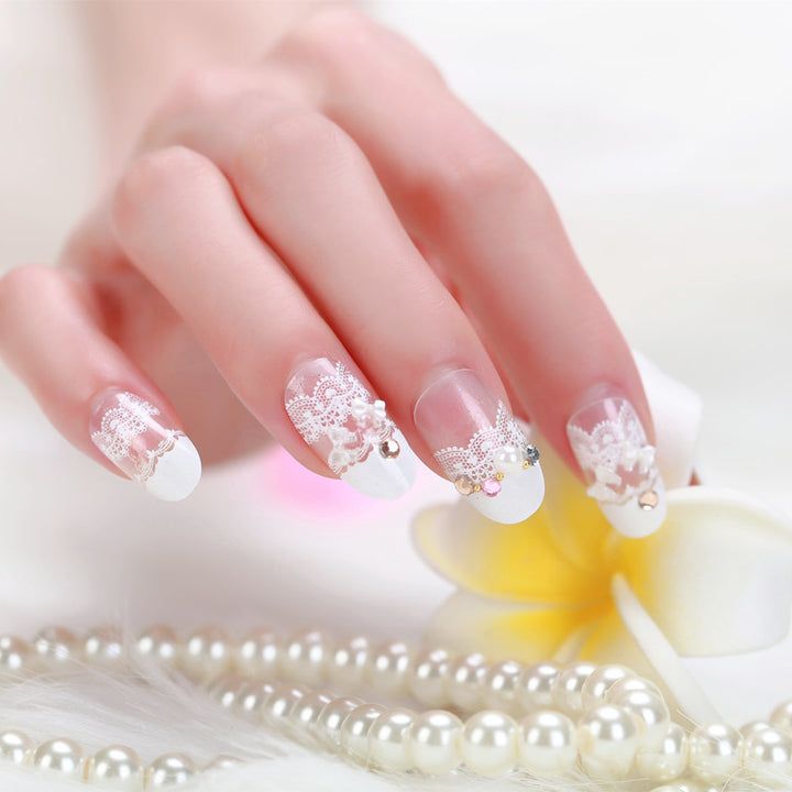 Elegant artificial nails with tip pattern and pearl embellishment Bowlift