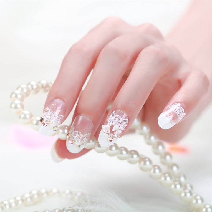 Elegant artificial nails with tip pattern and pearl embellishment Bowlift