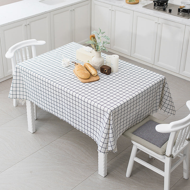 Wipeable tablecloth with fine check pattern, wavy hem and easy-care PVC finish Bowlift