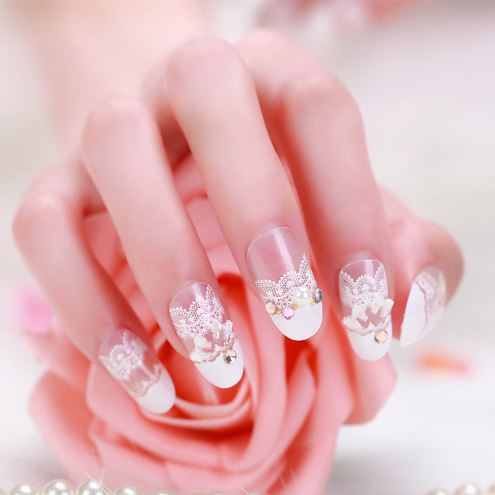 Elegant artificial nails with tip pattern and pearl embellishment Bowlift