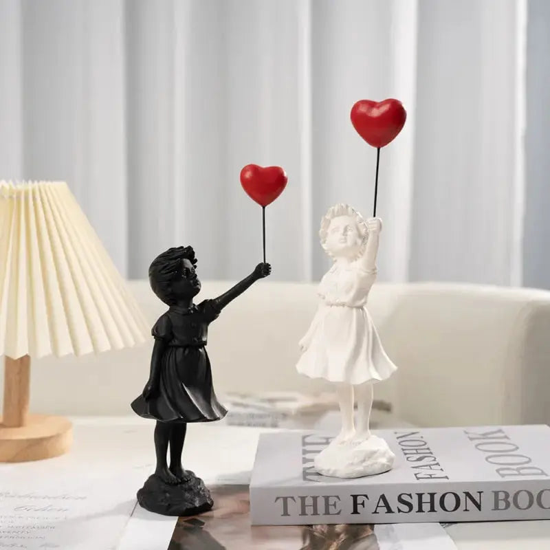 BowLift | Banksy flying Balloon Girl Statue