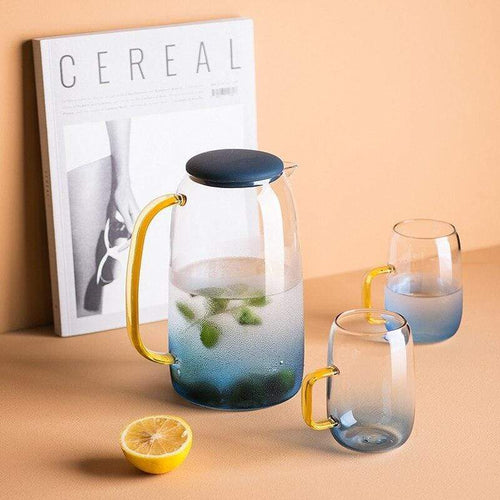Blue glass pitcher with matching drinking glass Bowlift