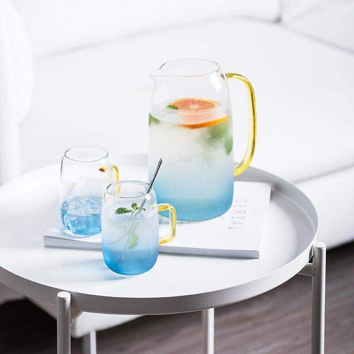 Blue glass pitcher with matching drinking glass Bowlift