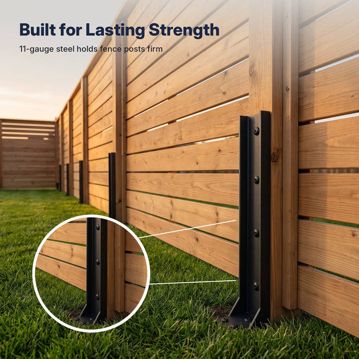 Black steel repair stakes fixed to the posts of a wooden privacy fence